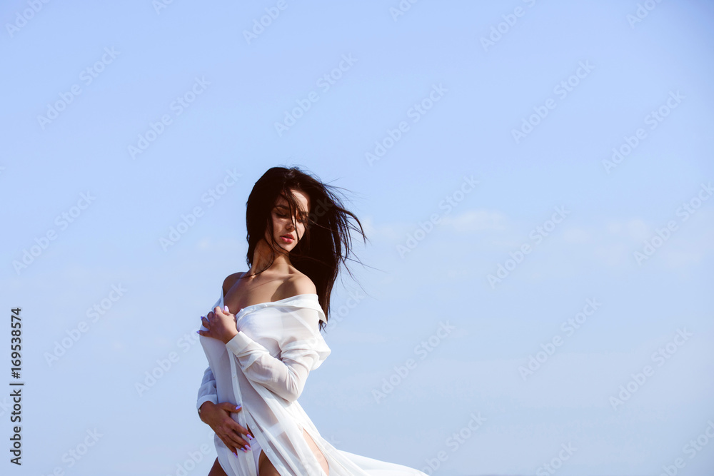 Woman with brunette hair and fresh makeup. Woman with brunette hair and fresh makeup.