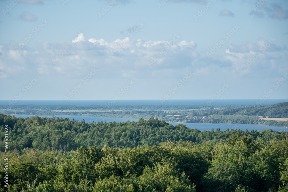landscape of city by lake with blue sky landscape of city by lake with blue sky
