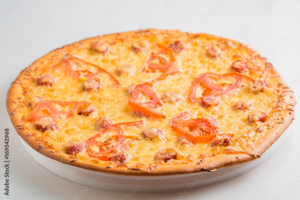 Homemade round classic russian pizza on a table Homemade round classic russian pizza on a table
