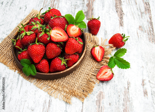 Bowl with fresh strawberries