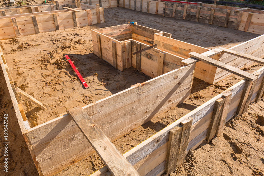 Clapboards for concrete foundation of a house