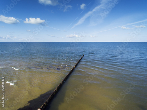 Fishing boat pier at Baltic sea coast near Liepaja, Latvia. © Janis Smits
