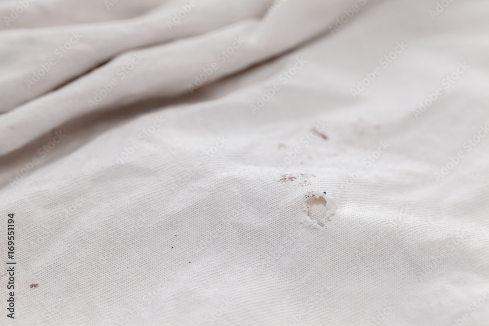 Obraz premium color paint stains on dirty white cotton fabric