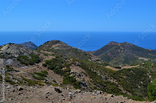 Landschaft auf Sardinien mit Bergen und Meer photo