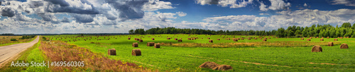 Panorama from the road, field and haystacks © parsadanov