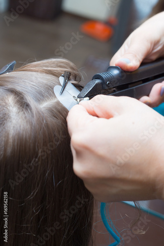 Haircut and the build-up of multicolored strands