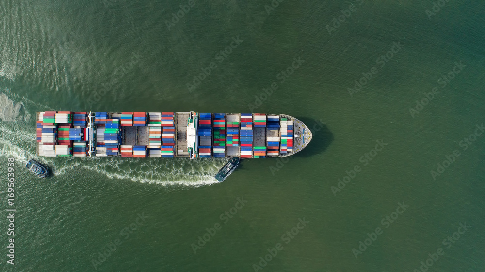 Fototapeta premium container,container ship in import export and business logistic,By crane,Trade Port , Shipping,cargo to harbor.Aerial view,Water transport,International,Shell Marine,transportation,logistic,trade,port