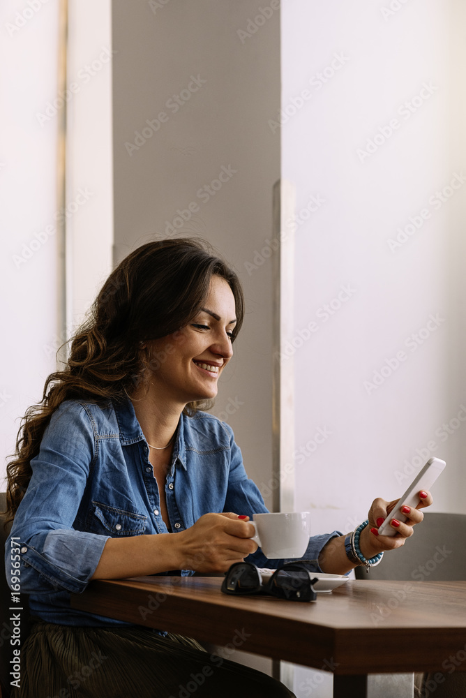 Beautiful woman using her mobile. Beautiful woman using her mobile.
