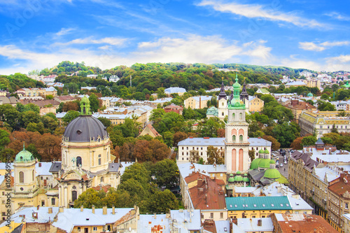 Beautiful view of the Dominican Cathedral, the Assumption Church and the historic center of Lviv, Ukraine, on a sunny day photo