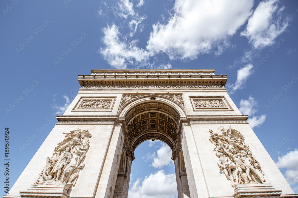 Close-up view on Triumphal arch during the sunny day in Paris