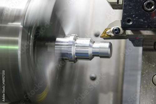 Photography CNC lathe machine (Turning machine) cutting the metal  screw thread part