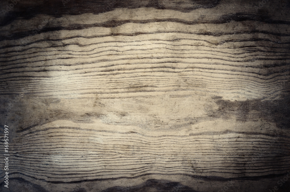 Obraz premium Vintage wooden textured background with natural pattern and scratches. Rustic dark surface with wood grainy texture. Old table top close up