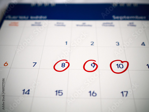Red circle marked on three days calendar for reminder or remember important appointment.