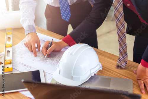 Architects and Engineers on Office Architecture Projects,Equipment construction engineers on the desk