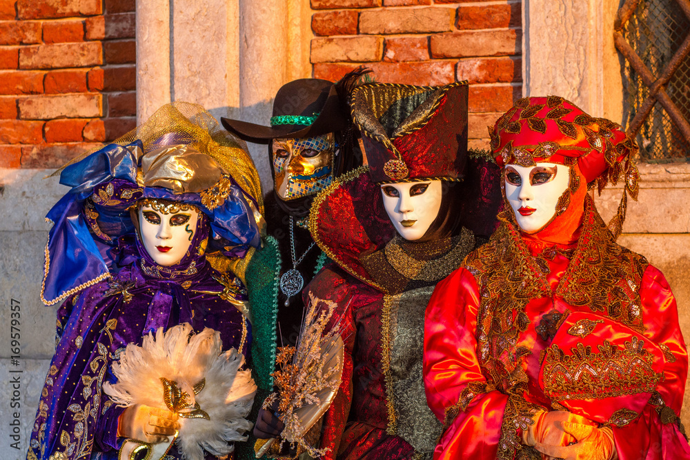 Group of masked costume characters at Venice Carnival