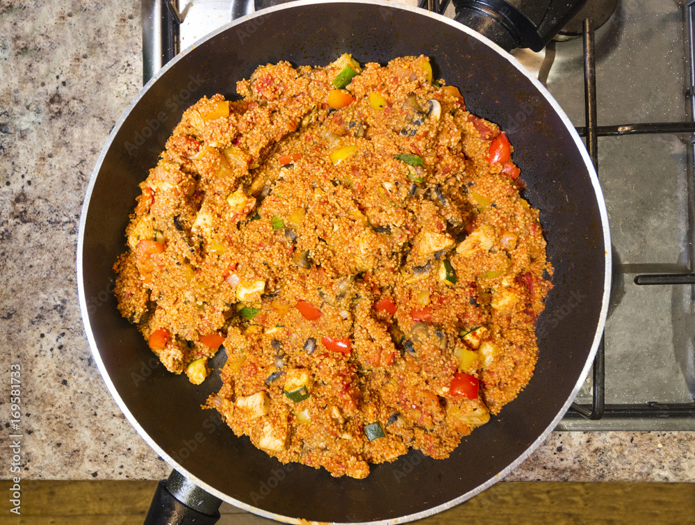 Large pan of Jambalaya on a stove top Large pan of Jambalaya on a stove top