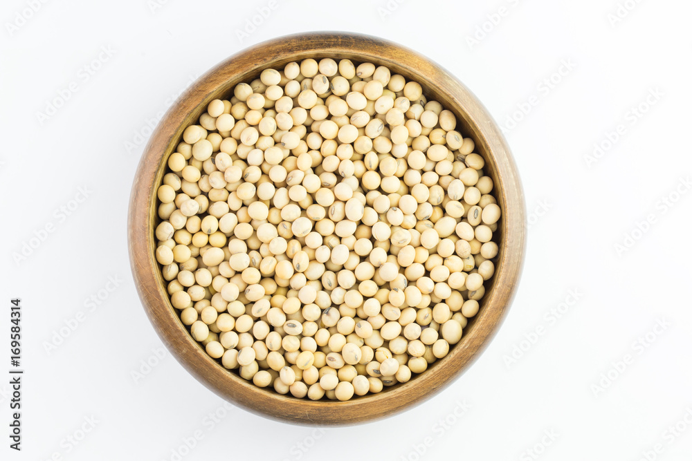 Soybeans in wooden bowl isolated on white background ,top view Soybeans in wooden bowl isolated on white background ,top view