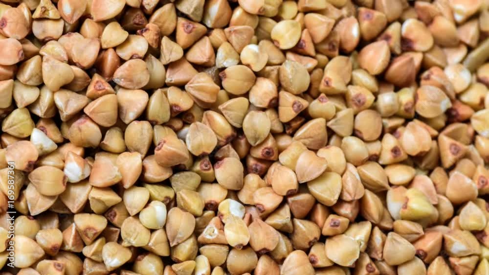 Buckwheat groats of whole grains close up video clip with zoom effect Buckwheat groats of whole grains close up video clip with zoom effect