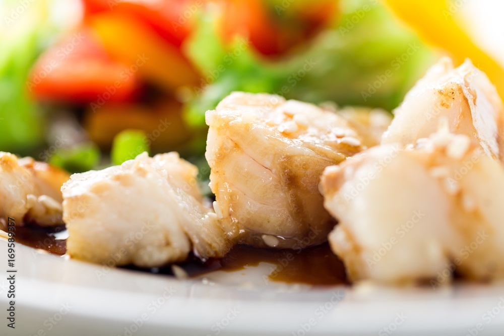 Dishes from fried chicken with vegetable.
