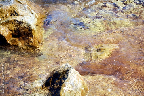 Yellow rocks and Tyrrhenian sea, background