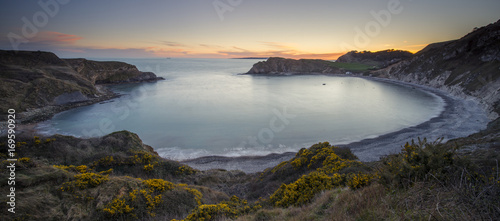 Lulworth Cove at sunset on the Jurassic Coast in Dorset.