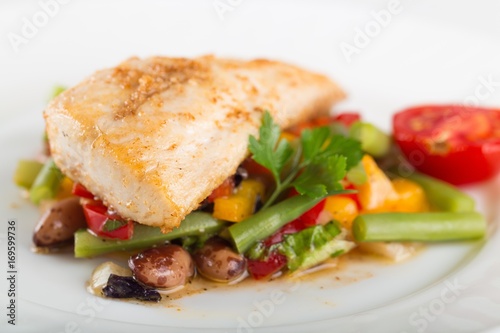 Fried fish with vegetable.
