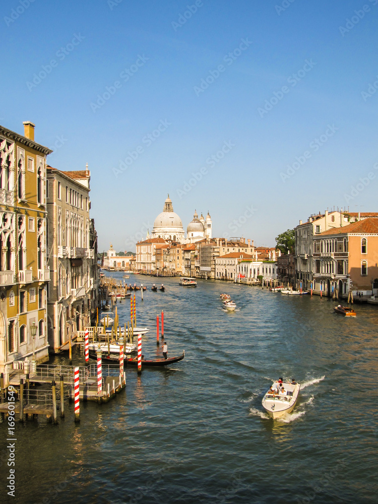 Venice, Italy - Circa June 2015: Grand Canal with gondolas and the Basilica di Santa Maria della Salute in the background