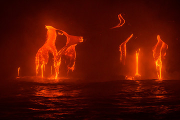 Keuken achterwand Bruin Lava Flowing Into the Pacific Ocean at Night, Big Island, Hawaii  © Markus