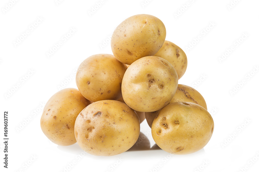 Heap of fresh young potatoes isolated on white background close up. Heap of fresh young potatoes isolated on white background close up.
