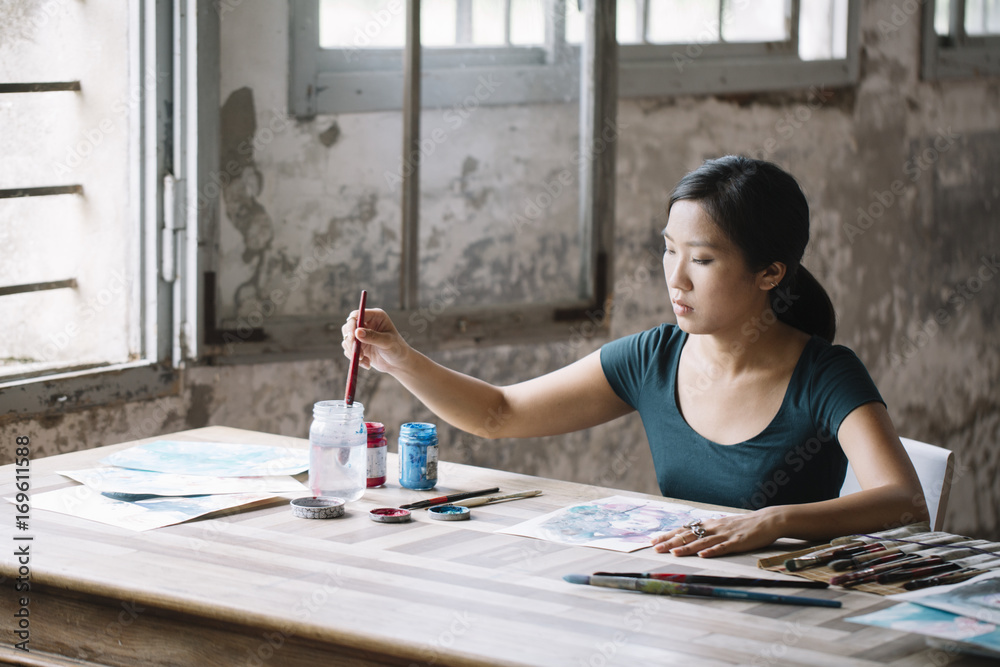 Vietnamese painter drawing with pencil Stock Photo | Adobe Stock