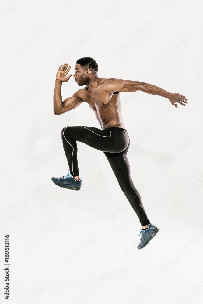 Shirtless sportswoman in motion Shirtless sportswoman in motion