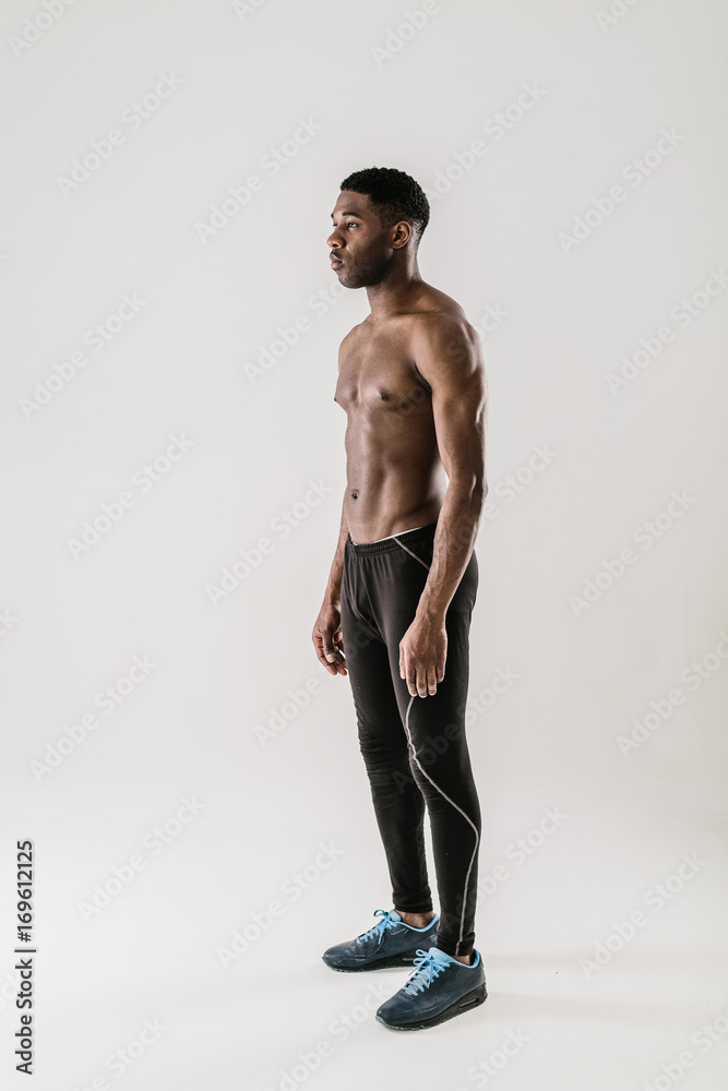 Young topless man with muscular torso Young topless man with muscular torso