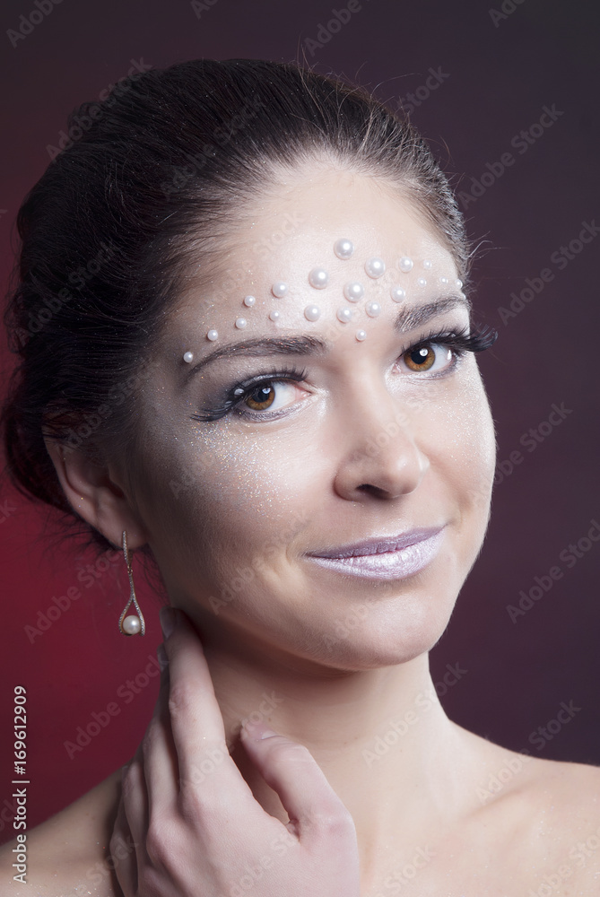 Close-up portrait of girl with bright makeup and clean skin Close-up portrait of girl with bright makeup and clean skin