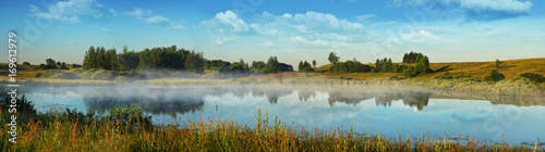 Fototapeta Naklejka Na Ścianę i Meble -  Morning fog over the lake