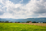 Rural landscape in Moravian-Silesian region in the Czechs republic against the background of mountains Western Carpathians