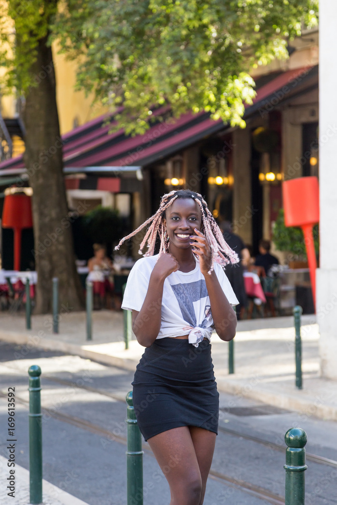 young fashion girl on the street of European city