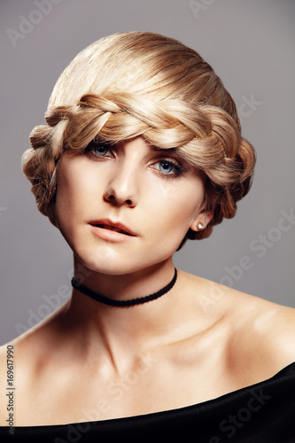 Beautiful blonde woman with braid hairdo
