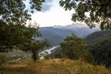 Горный пейзаж, Живописная поляна с видом на горное ущелье и реку, природа Северного Кавказа