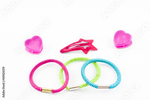 Elastic bands, buckles and hair clips.