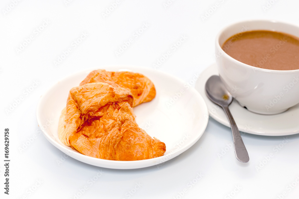 croissant and coffee on white background