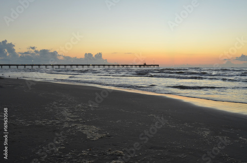 Padre Island beach lighted pier Corpus Christi, Texas photo