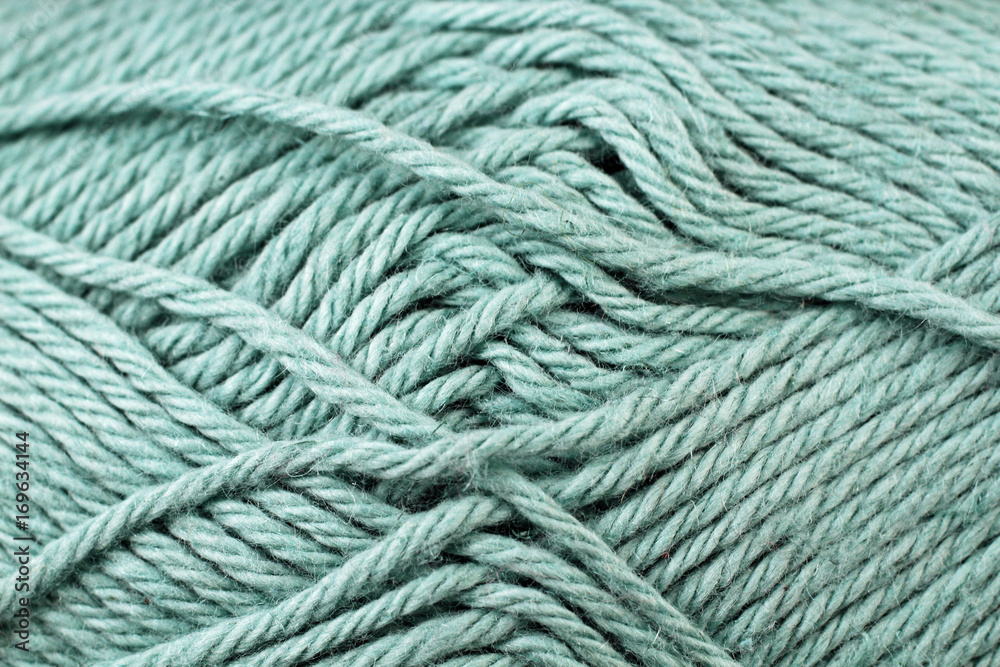 A super close up image of pale blue yarn A super close up image of pale blue yarn