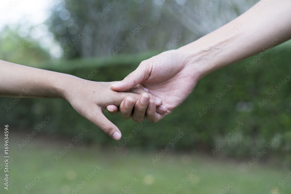 Giving a helping hand to another Giving a helping hand to another