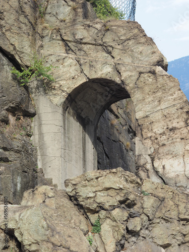 Ancient roman road arch in Donnas photo