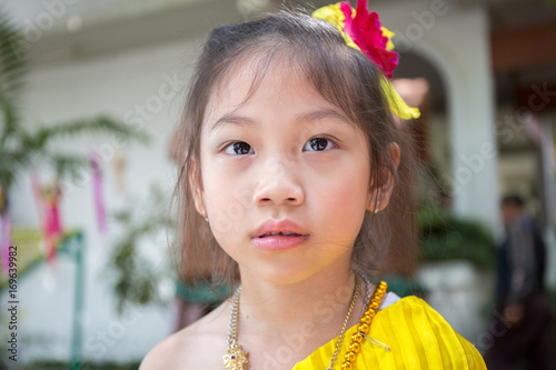 Thai littile girl in Thai dress photo