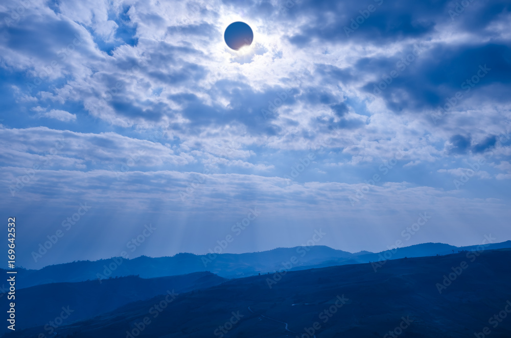 Scientific natural phenomenon. Total solar eclipse with diamond ring effect glowing on sky. Scientific natural phenomenon. Total solar eclipse with diamond ring effect glowing on sky.