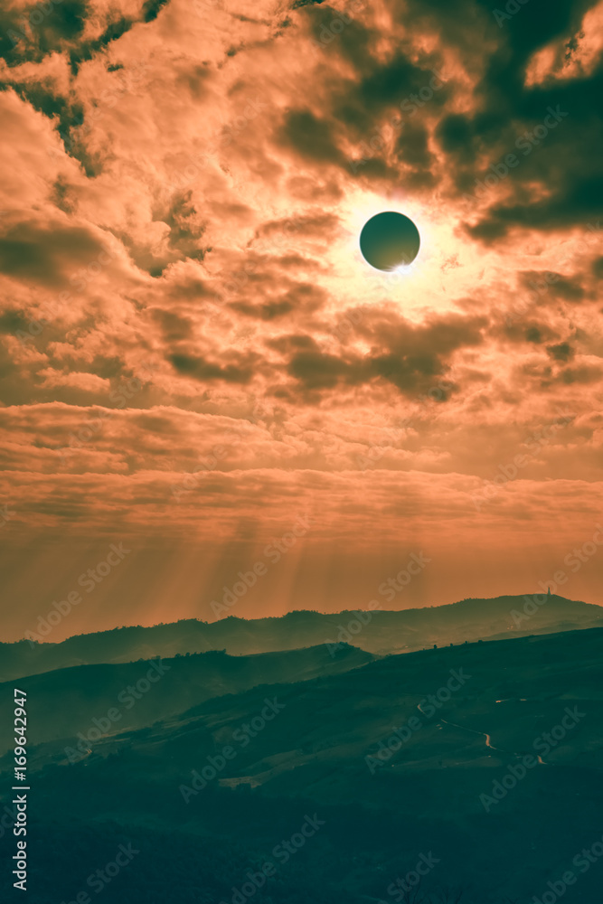 Scientific natural phenomenon. Total solar eclipse with diamond ring effect glowing on sky. Scientific natural phenomenon. Total solar eclipse with diamond ring effect glowing on sky.