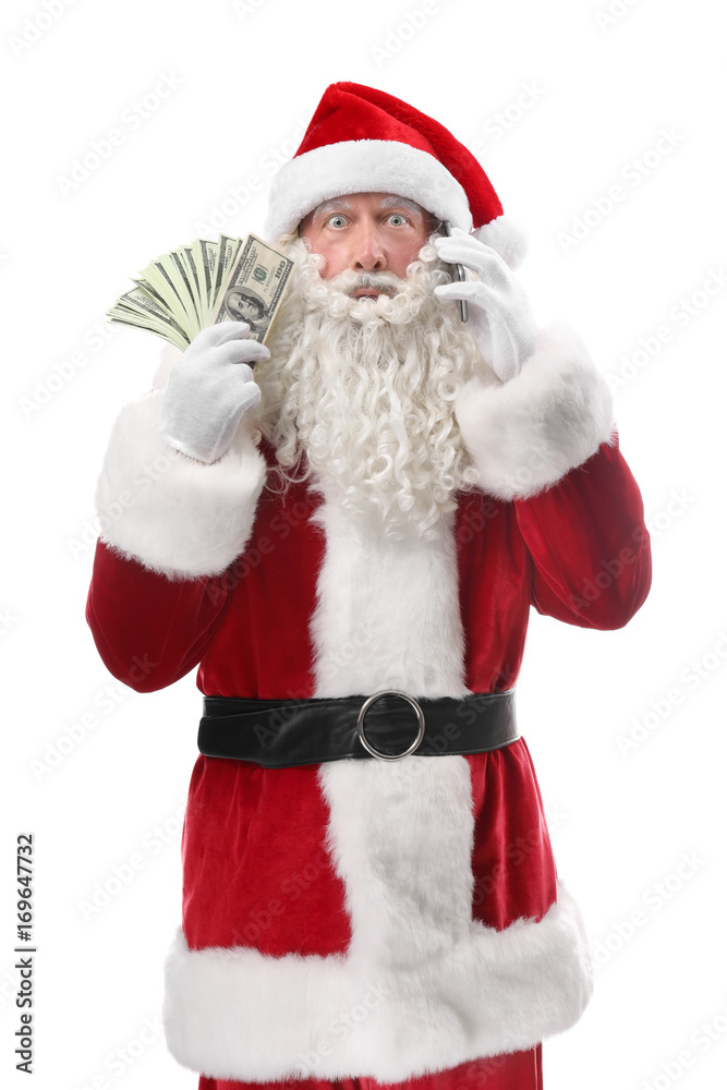 Santa Claus holding money and talking on phone against white background Santa Claus holding money and talking on phone against white background