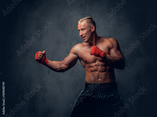 Shirtles boxer over grey background. © Fxquadro