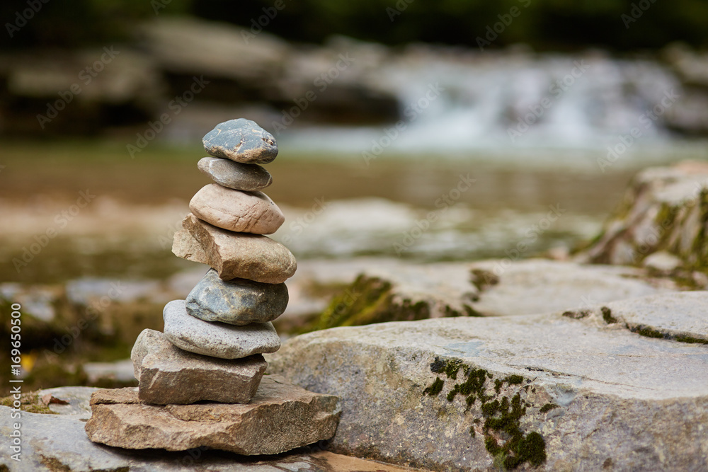 Stones arranged zen-like by the river Stones arranged zen-like by the river